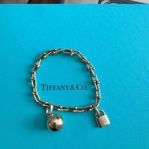 Tiffany & Co. Hardware Yellow Gold Chain Bracelet with Lock and Ball Charm